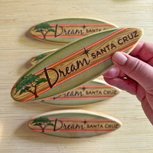 Load image into Gallery viewer, Mini Wooden Surfboard - Green &amp; Orange Cypress with &quot;Dream Santa Cruz&quot;
